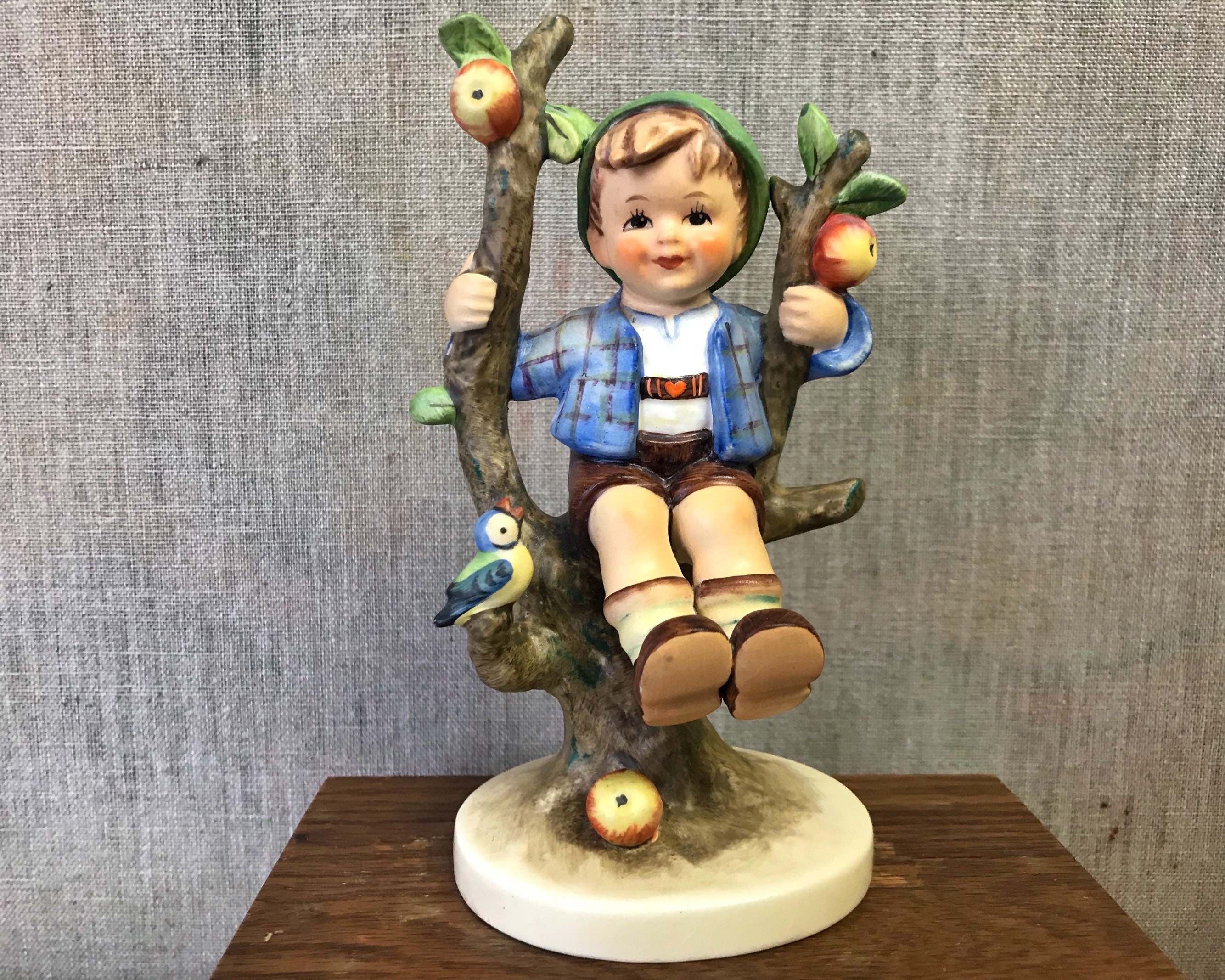 boy in apple tree hummel figurine