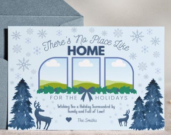 Tarjeta de felicitación navideña con nieve azul y anuncio de mudanza