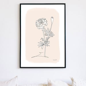 May include: A black and white line drawing of a marigold flower with a bud on a light pink background. The artwork is signed "Valerie Gordon".