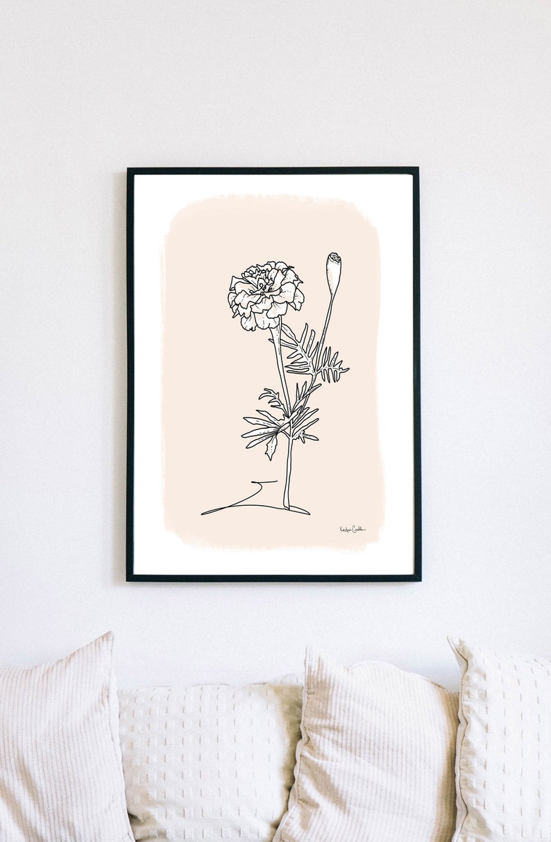 May include: A black and white line drawing of a marigold flower with a bud on a light pink background. The artwork is signed "Valerie Gordon".