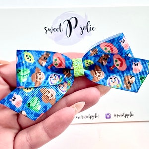 Toy Story Inspired Character Faces Print Ribbon + Glitter Hair Bow // Disney Toy Story Land Woody Jessie Buzz Print Hair Bow Headband