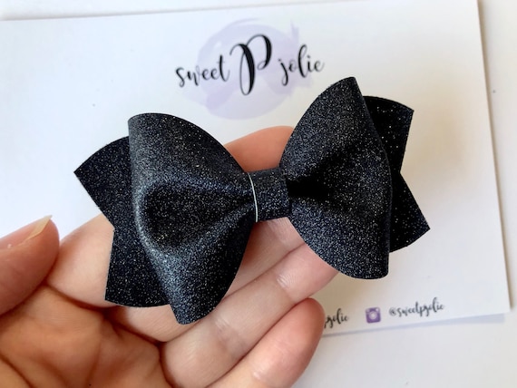 glitter canvas bow finished on a nylon headband or alligator clip Available in 5 beautiful glitters. Large