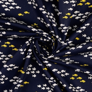 Cotton woven fabric fish yellow on dark blue
