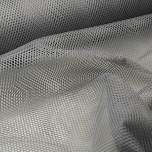 May include: Gray mesh fabric with a diamond pattern. The fabric is soft and flexible, making it ideal for a variety of projects.