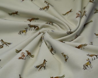 Jersey di cotone organico Foxes su beige chiaro