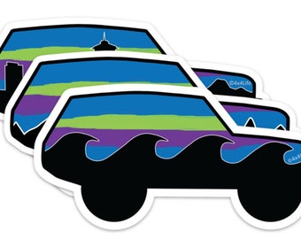 May include: Three black silhouette car stickers with a blue, green, purple, and white sunset design. The stickers have the text "4x4 Life" on the bottom right corner.
