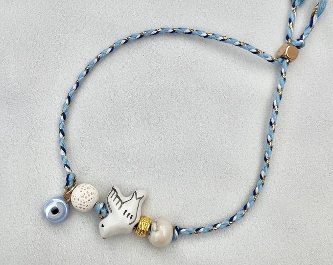 White dove evil eye blue string adjustable bracelet