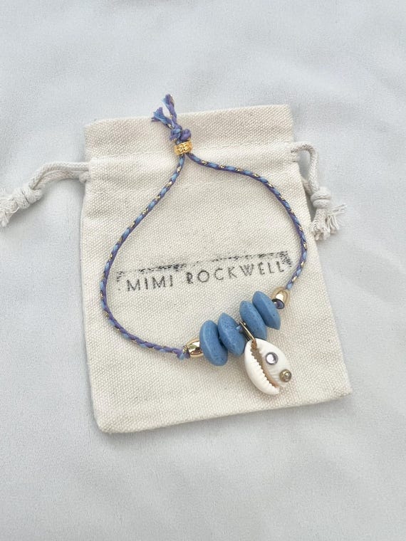 Recycled African blue glass bead shell blue string gold bracelet