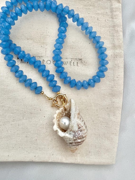 Pearl in shell sky blue bead necklace