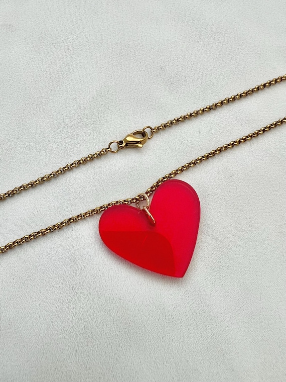 Red plexiglass heart pendant long gold chain necklace