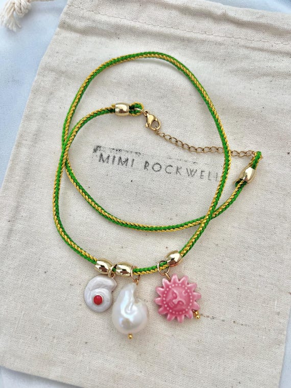 Baroque pearl pink sun shell green string bracelet