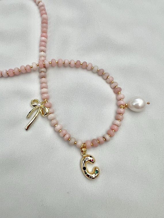 Custom gold Zircon bubble letter Baroque pearl bow Pink Opal beaded gold necklace