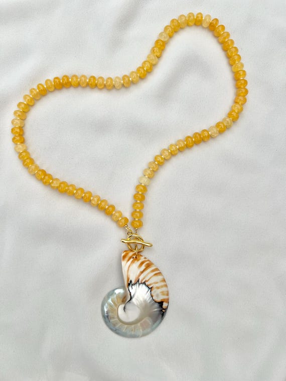 Unique Nautilus shell pendant yellow glass bead necklace