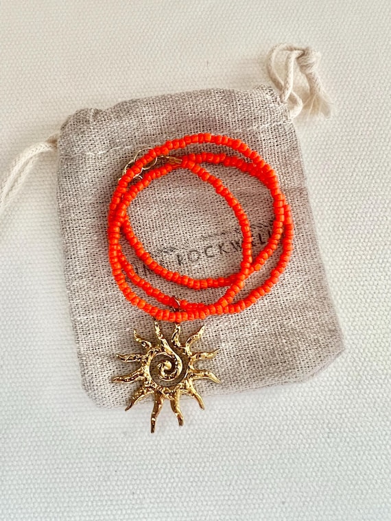 Orange seed bead gold sun charm necklace
