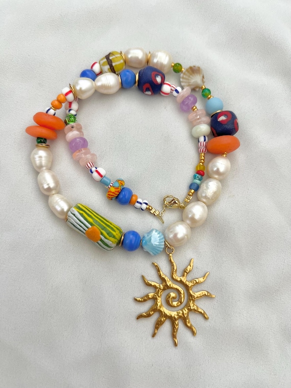Sun pendant multicoloured Baroque freshwater pearl and mixed African glass bead gold necklace