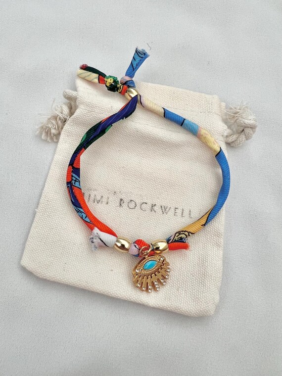 Recycled scarf string evil eye pendant gold bracelet