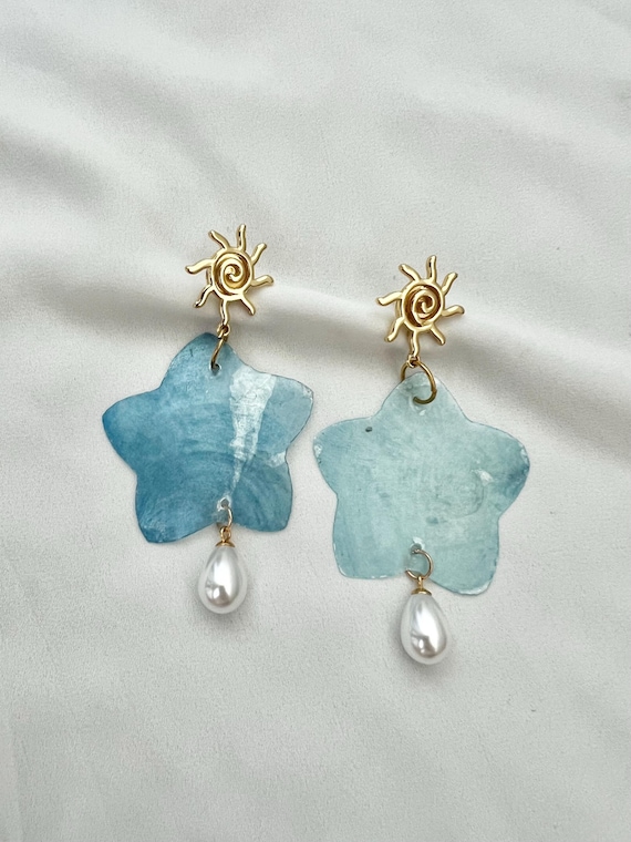 Light blue Capiz shell star sun gold pearl earrings
