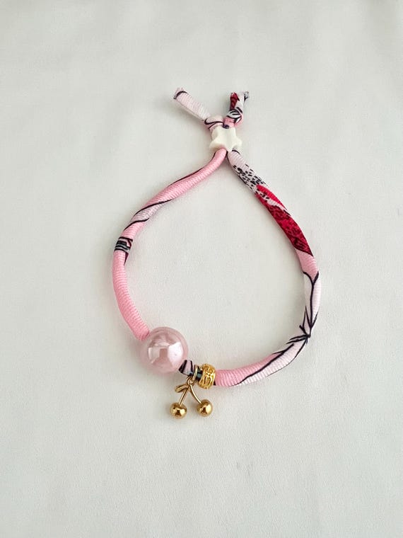 Cherry pink recycled scarf string bead bracelet
