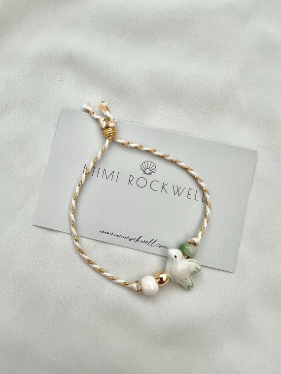Hand painted white green ceramic dove beige string bracelet