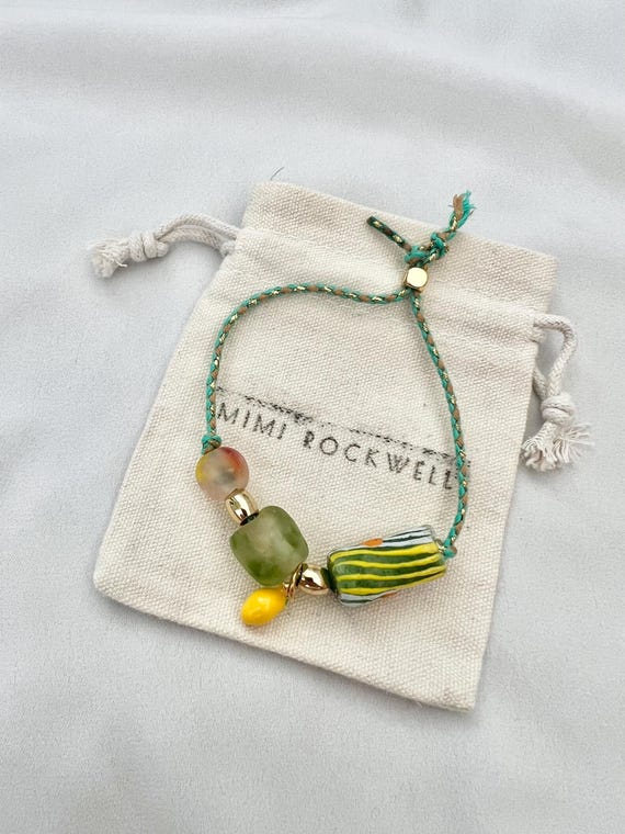 Recycled African glass bead lemon green string gold bracelet