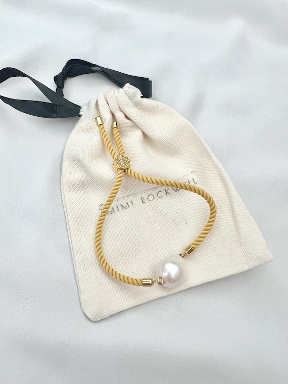 Unique large Baroque pearl gold yellow silk string bracelet