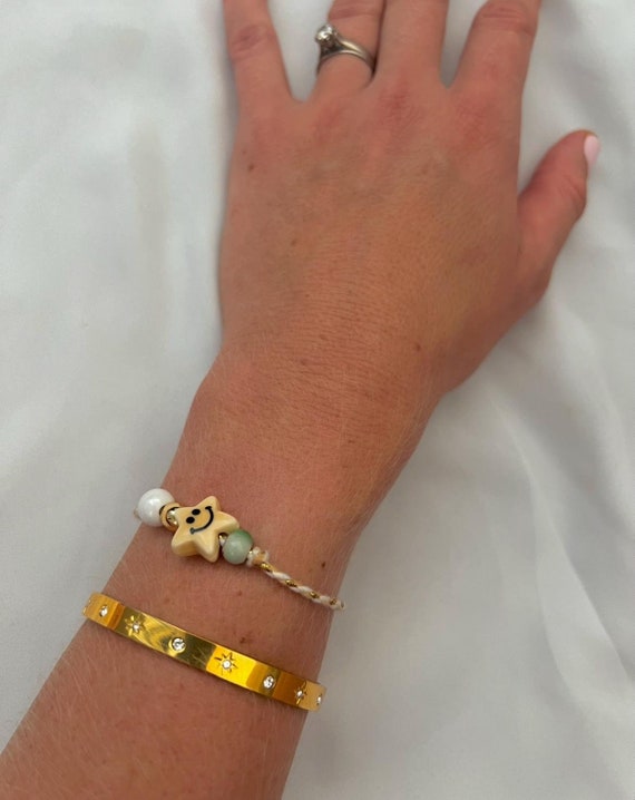 Happy star beige string bracelet