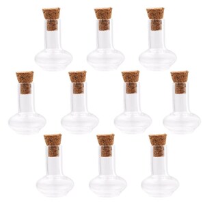 May include: Ten clear glass bottles with cork stoppers. The bottles are round with a narrow neck and a bulbous base.