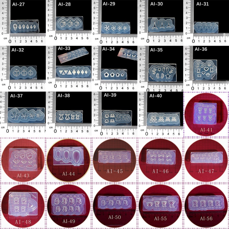 May include: A set of 16 clear silicone molds for crafting. The molds feature various designs, including hearts, stars, anchors, and animals. The molds are arranged in rows on a red surface.