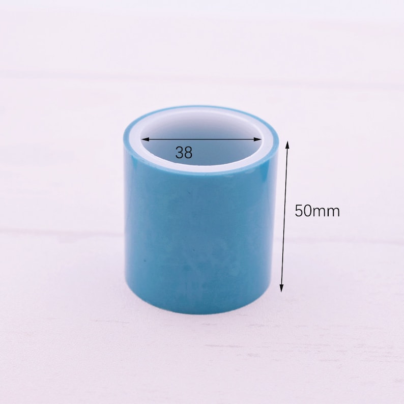 May include: A roll of blue tape with a white core. The tape is 38 inches wide and 50 millimeters tall.