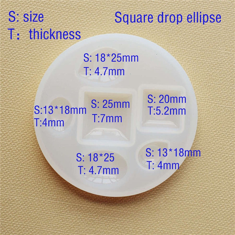 May include: A white silicone mold with six different shapes for resin casting. The mold includes a square, a rectangle, a circle, and three different sized ovals. The mold is labeled with the size and thickness of each shape in millimeters.