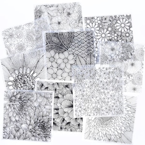 May include: A collection of square, black and white floral and patterned designs. The designs include detailed illustrations of flowers, leaves, and abstract patterns. The images are arranged on a white background, showcasing the intricate line work.