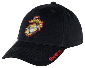 May include: Black baseball cap featuring the US Marine Corps emblem in yellow, red, and white. The cap has a curved brim and the words "Semper Fi" embroidered in red on the side. A classic, adjustable hat.