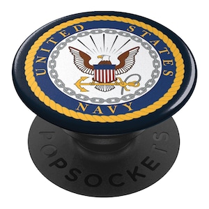 May include: A black phone grip with a navy blue and gold circle design. The circle features a white eagle with a red, white, and blue shield, an anchor, and the words "United States Navy".