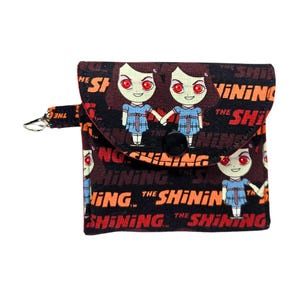 Mochila de acordeón de 3 bolsillos de Shining Twins Horror con cremallera interior y cierre a presión