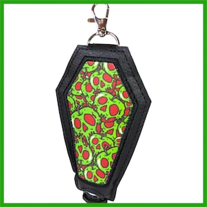 Giftapfel-inspirierter Handcremehalter PocketBac Halter