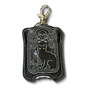 Porta-álcool em gel PocketBac inspirado em Hocus Pocus Binx