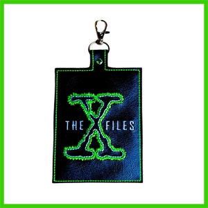 Op FBI X FILES geïnspireerde vaccinkaarthouder