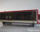 Classic 1972 Sony firy-red flip-radio-alarm-clock, the Beast from the Far East TFM-C590W