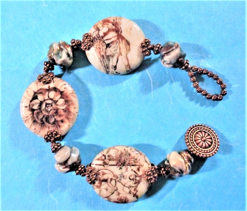 Spacers Bead Caps Bracelet: Old World Decoupage Coin Beads; BronzeBeigeBlue Raku Beads; Antique Copper Beads /& Button-and-Loop Clasp