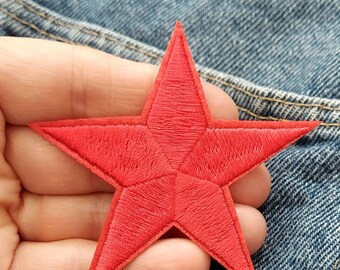 jeans with red star patches