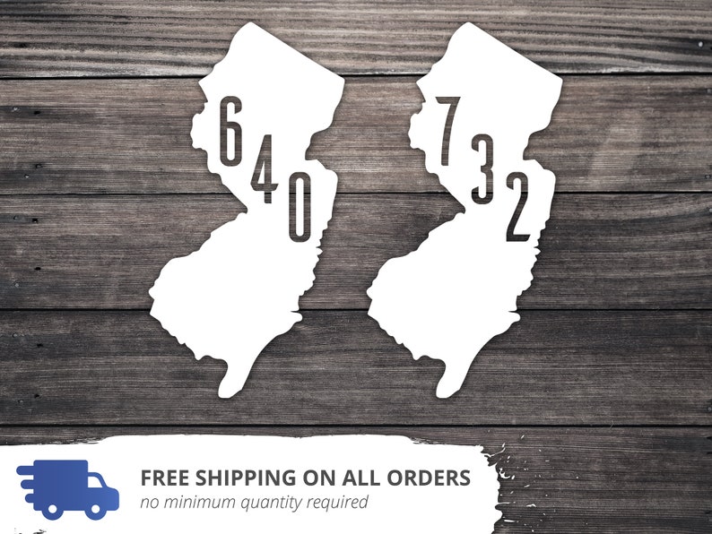 May include: Two white outlines of the state of New Jersey with the area codes 640 and 732 printed inside.
