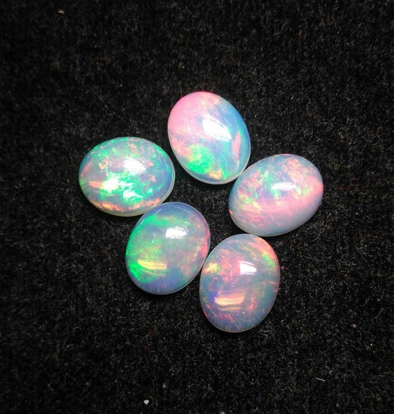ÓPALO DE WELO etíope venta al por mayor Lote de piedras preciosas ópalo de fuego oval cabochon Natural AAA