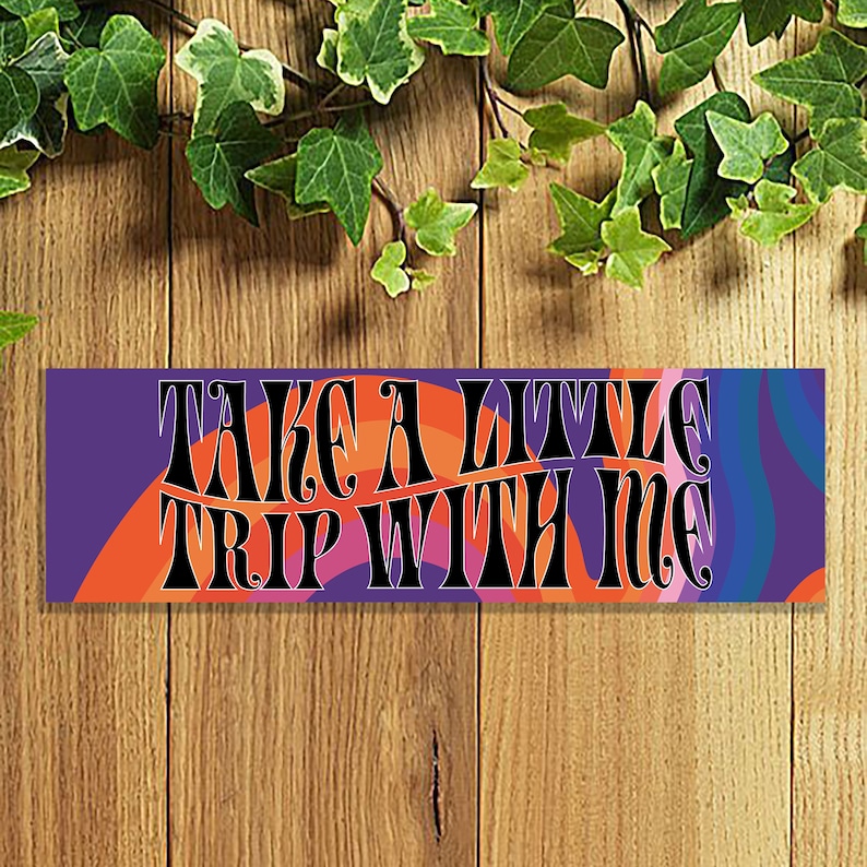 May include: A colorful psychedelic banner with the text "Take a little trip with me" in black lettering.