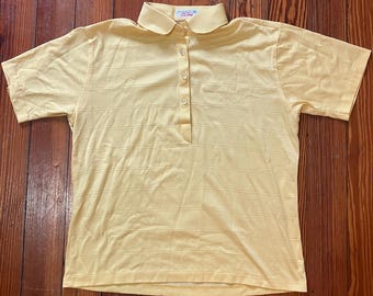 Vintage 1970s butter yellow polo shirt with peter pan collar, retro short sleeve shirt