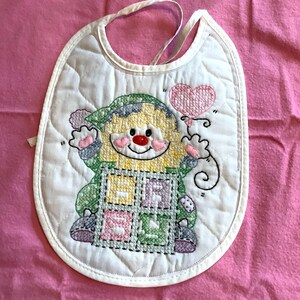 All bibs and blankets are handmade. Make mealtime a special occasion for your little one. They are machine washable .