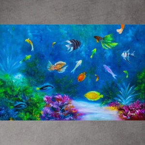 May include: A colorful underwater scene with various fish swimming in a blue ocean. The fish are orange, yellow, green, blue, and black. There are also coral reefs and plants in the scene.