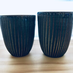 Chai/thandai/lassi Black soda fired Cups with white-orange lines