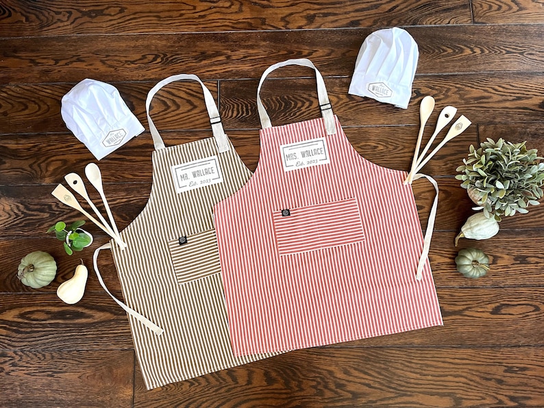 custom Mr and Mrs aprons in classic stripes from quality cotton, personalized with handprinted name and date tag, as well as custom chef hats and wooden tools