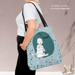 New mom custom baby blue tote bag personalized with line art portrait illustration from photo of the newborn on colorful back ground and terrazzo pattern text.