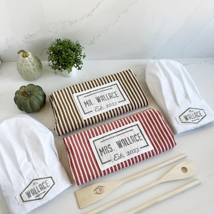 custom Mr and Mrs aprons in classic stripes from quality cotton, personalized with handprinted name and date tag, as well as custom chef hats and wooden tools